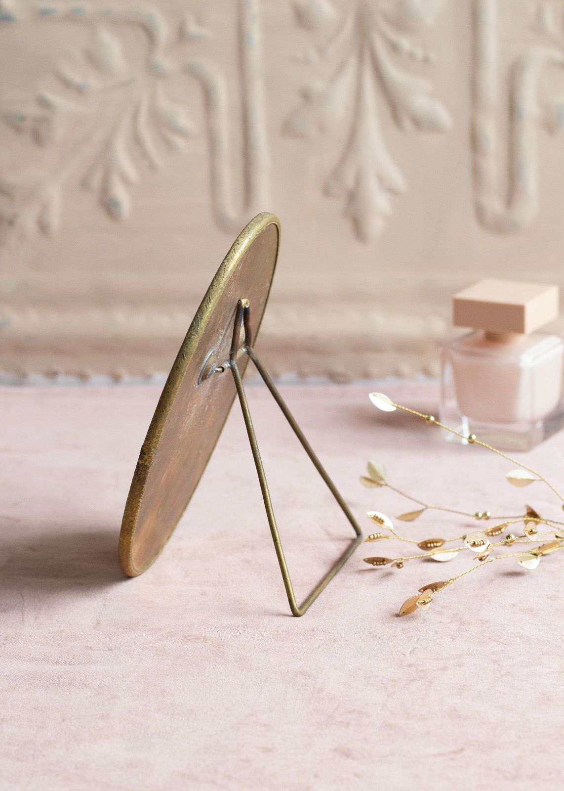 Oval mirror on stand