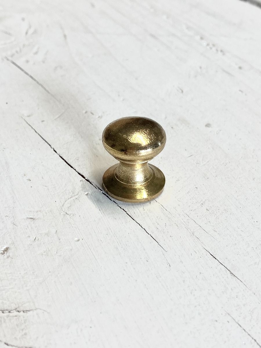 Knob gold coloured