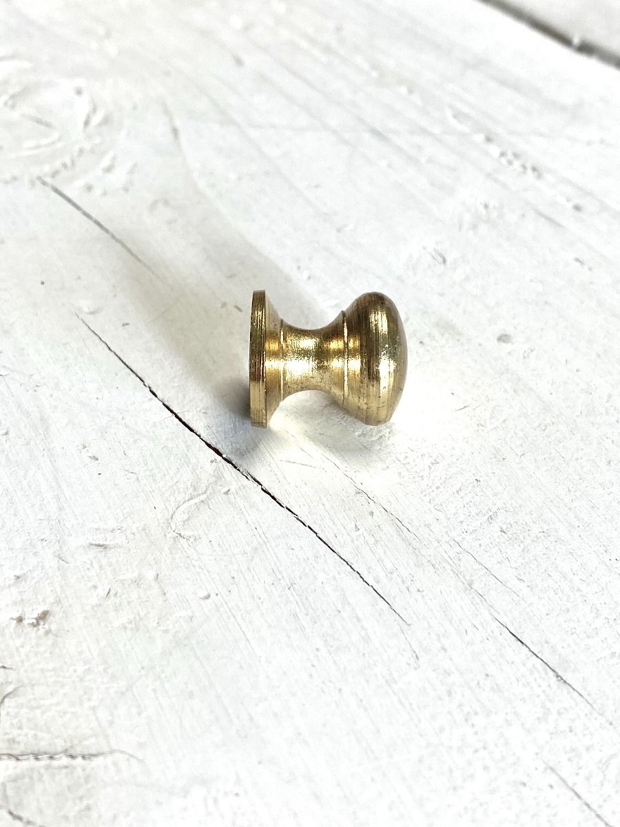 Knob gold-coloured