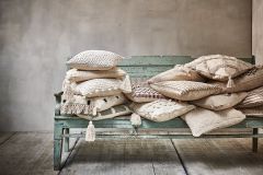 Cushion natural with tassels