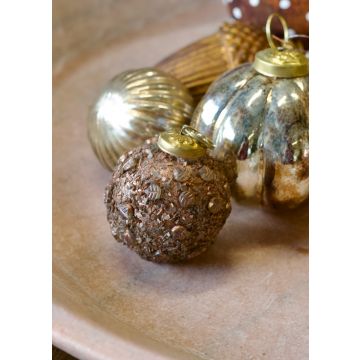 Christmas ball copper polish